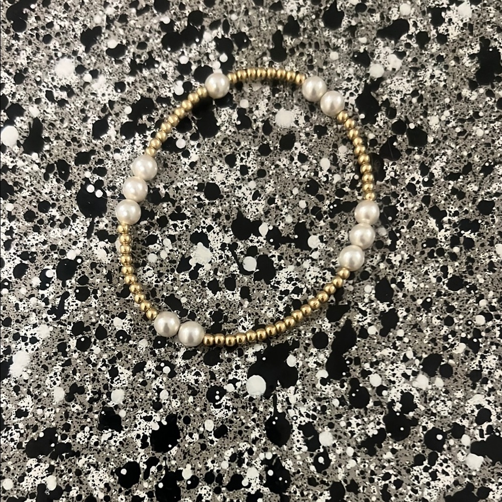 Elegant Gold and White Enewton Beaded Bracelet